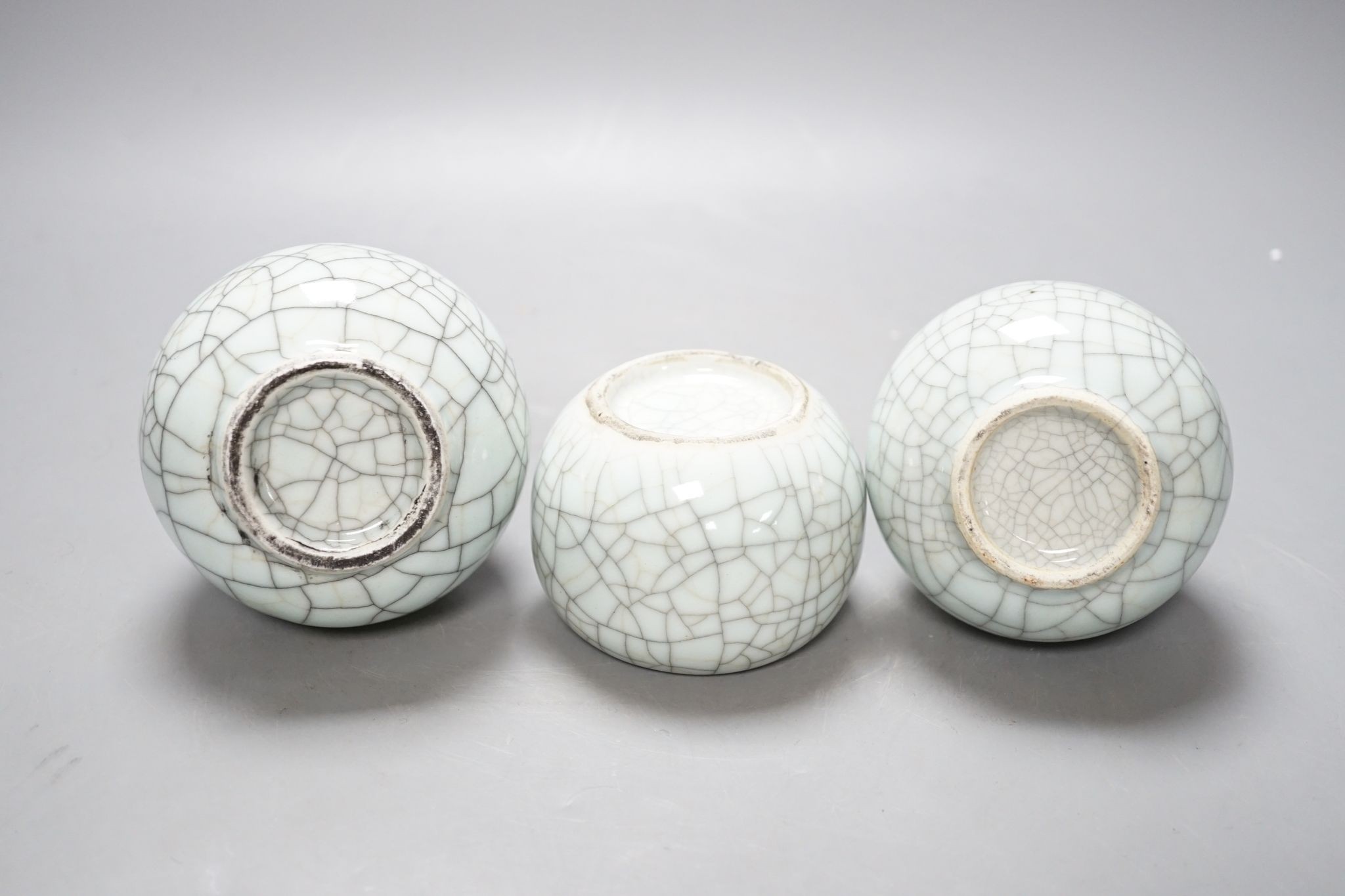 Three Chinese crackle glaze vases, 16cm